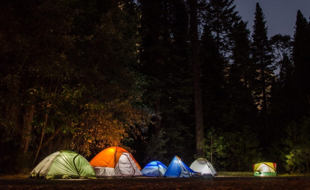 Six tents in the woods